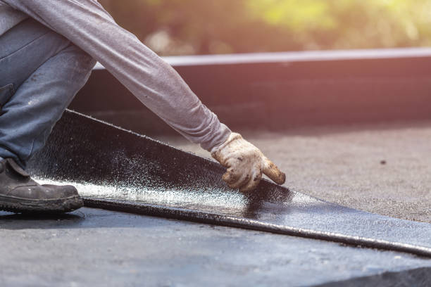 Professional Emergency Waterproofing technician working in Osseo, MI